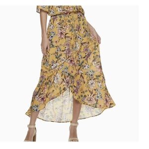Live To Be Spoiled hi-low skirt. Yellow with flowers med
